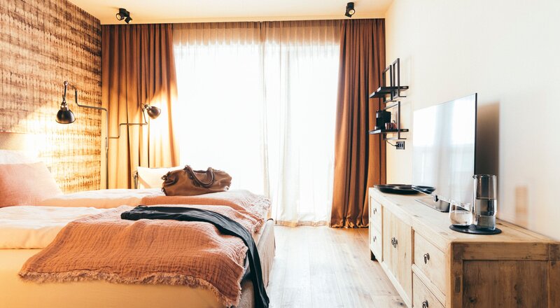 Gold Zimmer–DAS RIVUS–Luxuriös wohnen im Salzburger Land